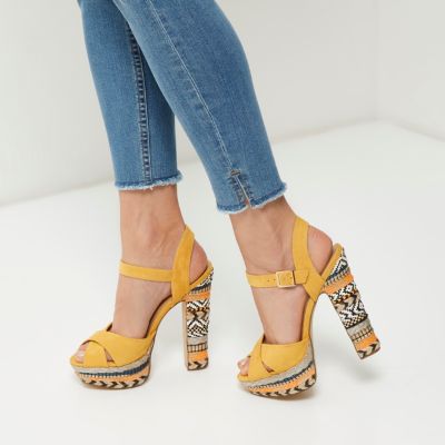Yellow print suede platform heels